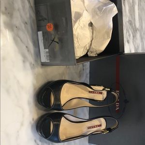 Prada black platform peep toe pump
